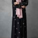 Black abaya with pink bow embroidery in crepe fabric by Nimah Wear