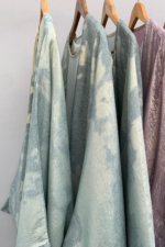 Sage green printed open abaya in foil silk by Nimah Wear available in Pakistan